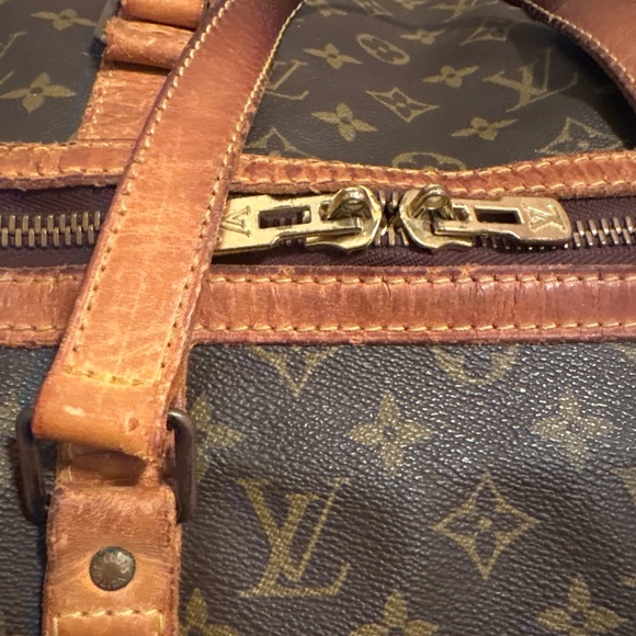 Louis Vuitton duffle bag see pics for wear bought at holt renfrew - Picture 2 of 13